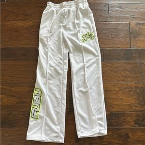 white pants with neon greeen details
